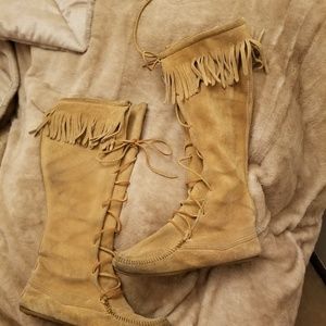 Minnetonka knee high lace up fringe boot